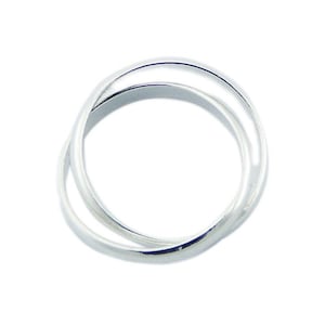 May include: A silver ring with two intertwined bands.