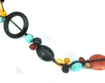 Necklace in silk thread and natural stones