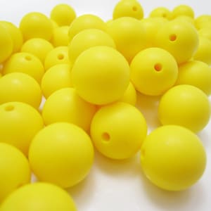 9mm Yellow Round Silicone Beads. Loose, highest quality, BPA free silicone craft supplies Canada USA Europe. Wholesale Bulk Discount.