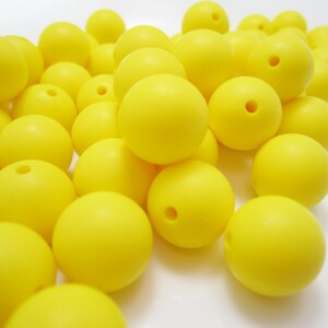 12mm Yellow Round Silicone Beads. Loose, highest quality, BPA free silicone craft supplies Canada USA Europe. Wholesale Bulk Discount.