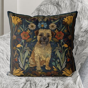 May include: A cushion with a dark blue background featuring a brown and tan dog sitting in a field of colourful flowers. The flowers are drawn in a vintage style.