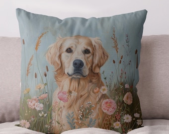 May include: A golden retriever dog with a soft, fluffy coat is sitting in a field of wildflowers. The dog is looking directly at the camera with a gentle expression. The flowers are in shades of pink, white, and yellow, and the background is a soft blue.