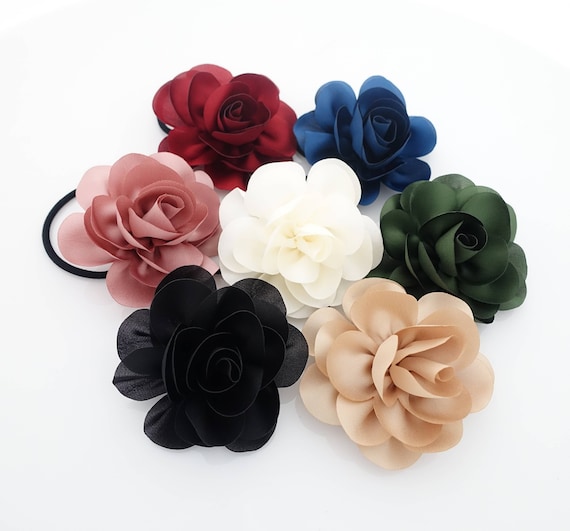 Coppia elastici per capelli con fiocco e bottoni caramella - Donna