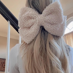 Teddybär große Haarschleife