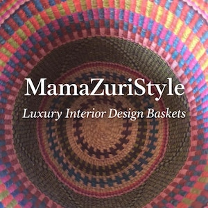 May include: A round woven basket featuring a vibrant, multi-coloured pattern of red, pink, blue, and green horizontal bands. The text MamaZuriStyle Luxury Interior Design Baskets is centred over the interior view of the coiled basket structure.