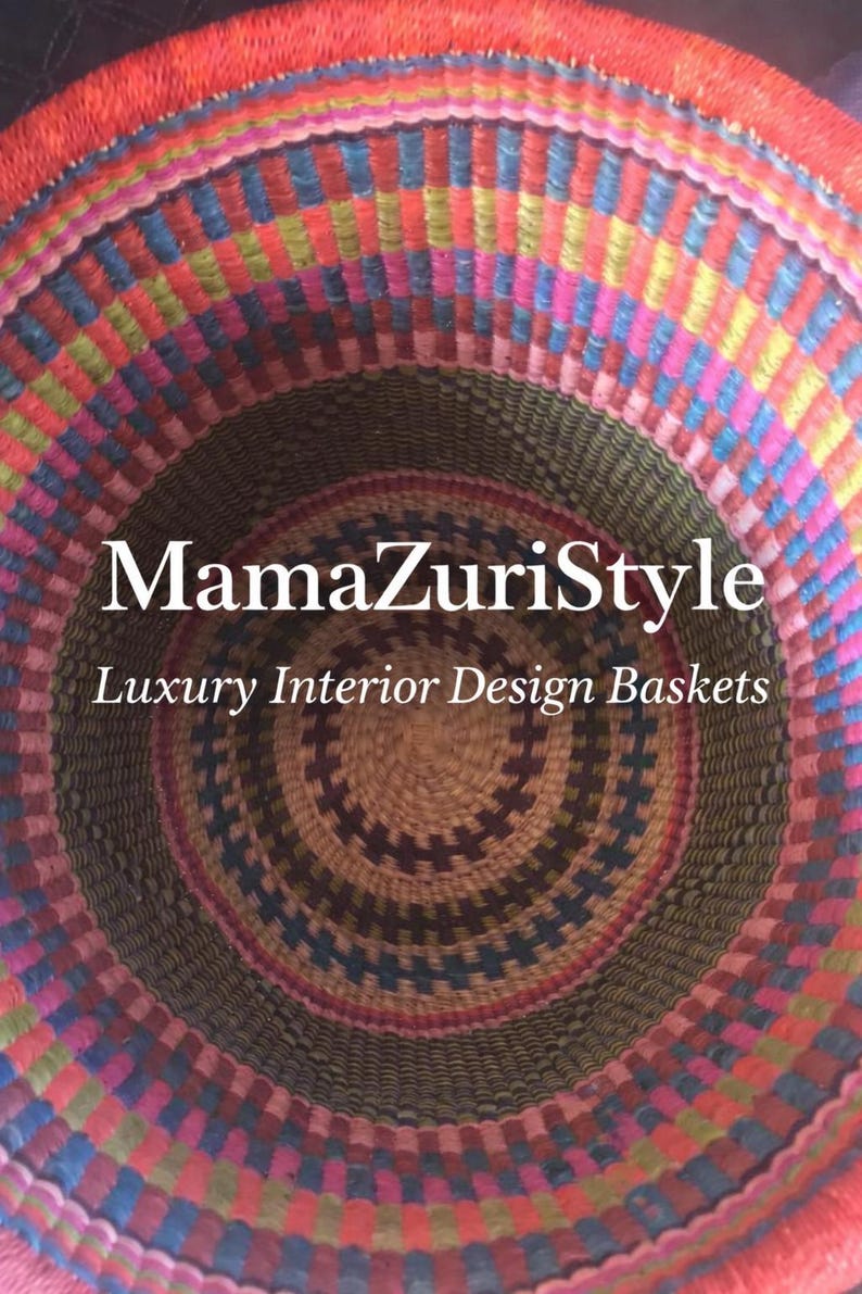 May include: A round woven basket featuring a vibrant, multi-coloured pattern of red, pink, blue, and green horizontal bands. The text MamaZuriStyle Luxury Interior Design Baskets is centred over the interior view of the coiled basket structure.