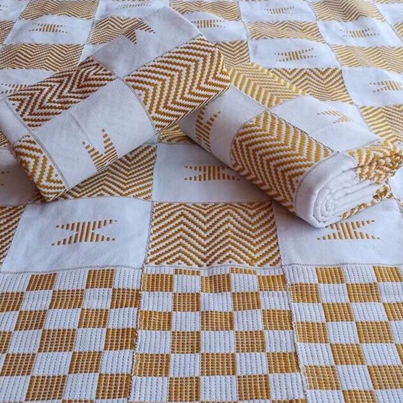 white and gold kente dress