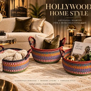 May include: Three round, handwoven baskets featuring a vibrant, multi-coloured geometric pattern with dark blue rims and handles. The baskets are filled with a cream-coloured knit throw, decorative pillows, and a book titled The Art of Living.