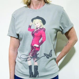 DOLLY PARTON - Cowgirl - Unisex T-shirt - Officially Licensed - american singer, country music, country legend, tennnessee, cowgirl