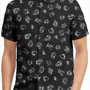May include: A black short-sleeved button-down shirt featuring a repeating white line-art pattern of various small animal figures. The garment has a standard collar, a front button placket, and a straight hemline, showcasing a consistent graphic print.