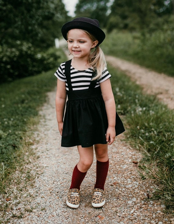 black dress with suspenders