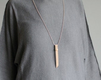 Necklace Claus, cork with a bronze colored ball chain or grey leather with a bronze colored ball chain