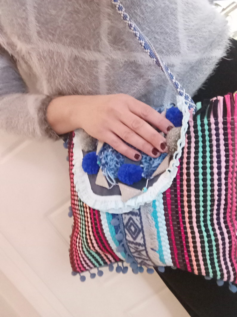 boho handwoven messenger bag in bright colours rag ethnic bag multi colour stripes embellished with fabric ribbons and pom pom inner fabric