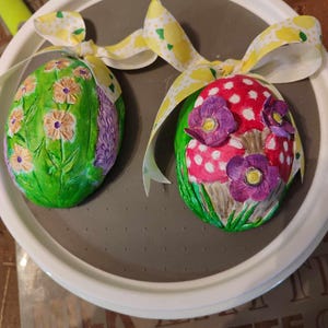 egg ornaments handmade air dry clay embellished decoupage inner parts easter table decoration hang on the wall or display by mademeathens