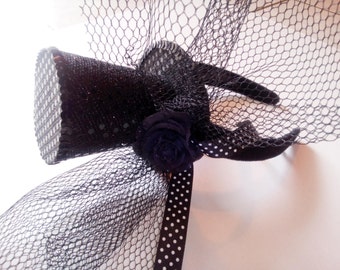 Mini top black hat hairband small sequins black tulle, spotted ribbon in black and white and a small rose flower special occassion accessory