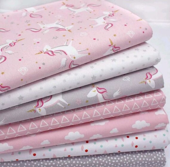 Beautiful unicorn cot bed duvet cover bumper pillowcase and nappy stacker