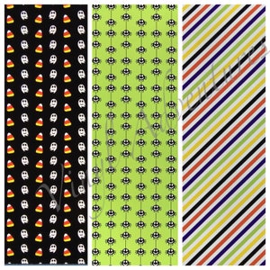 May include: Three Halloween themed patterned scrapbook paper strips. The first strip has a black background with white ghosts and orange and yellow candy corn. The second strip has a green background with black spiders. The third strip has a white background with black, orange, yellow, green, and purple stripes.