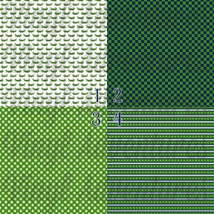 May include: Four different green and white patterned fabric swatches. The first swatch has a white background with a repeating pattern of green alligators. The second swatch has a green and navy blue checkered pattern. The third swatch has a green background with a repeating pattern of white polka dots. The fourth swatch has a green and white striped pattern.