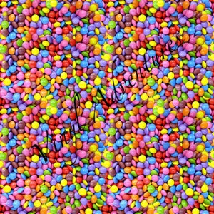 May include: A close-up image of a large pile of colorful candy coated chocolate pieces. The candies are in various shades of red, orange, yellow, green, blue, purple, brown, and pink.