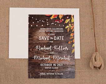 May include: Save the date card with a rustic wood background and fall foliage. The text reads "Mark your calendars, we're getting married! Please save the date for Rachael Rollins and Michael Morchut, October 16, 2021, Huntley, Illinois. Formal invitation to follow."