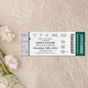 May include: A green and white wedding ticket save the date announcement for John and Allison. The ticket says "Save the Date!" and "John & Allison are getting married December 16th, 2022 Clarkston, MI".