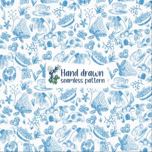 May include: A hand-drawn seamless pattern in blue on a white background. The design features strawberries, flowers, mushrooms, ladybugs, teacups, and blueberries. The text "Hand drawn seamless pattern" is also included.