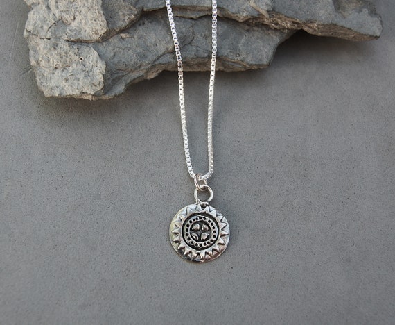 sun symbol necklace