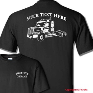 May include: Black t-shirt with a white silhouette of a semi-truck on the back. The text "YOUR TEXT HERE" is above the truck. The front of the shirt has the text "YOUR TEXT OR NAME" in white.