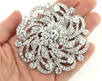 silver brooches and pins