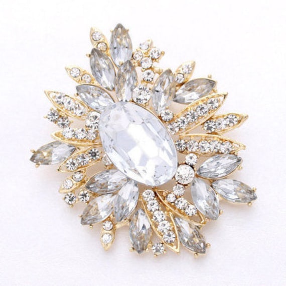 Gold brooch hotsell for dress