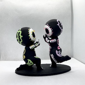 Figura de esqueleto de calavera de azúcar pintada a mano e impresa en 3D
