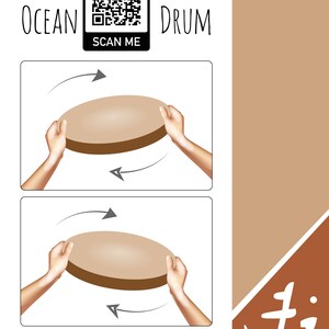 May include: Two hands hold a brown wooden drum and rotate it in a clockwise direction. The text "OCEAN DRUM" is at the top of the image. The text "MOVE IN A ROTARY DIRECTION" is at the bottom of the image.