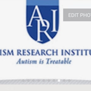 May include: A blue and white logo for the Autism Research Institute. The logo features the letters "ARI" in a shield shape. The text "Autism is Treatable" is below the logo.