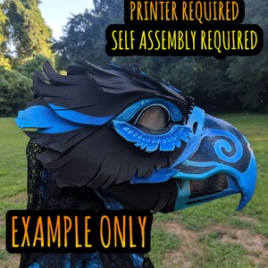 May include: A blue and black 3D printed bird mask with a mesh eye opening. The mask is partially assembled and has a feathered crest. The text "DIGITAL PATTERN PRINTER REQUIRED SELF ASSEMBLY REQUIRED" is displayed above the mask. The text "EXAMPLE ONLY" is displayed below the mask.
