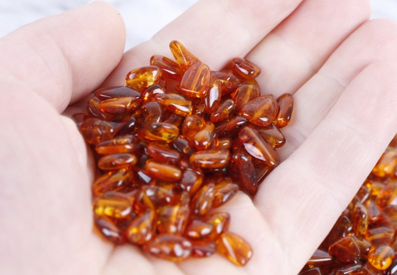 Dark Honey Bean Natural Amber Drilled BeadsCrafters 11mm-7mmApprox 60 amber beads in each 10 grams Baltic Amber Beads with holes