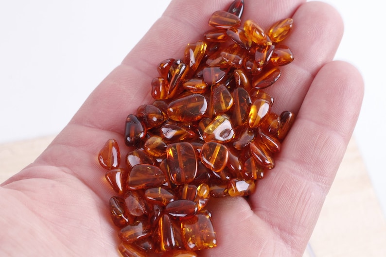 Dark Honey Bean Natural Amber Drilled BeadsCrafters 11mm-7mmApprox 60 amber beads in each 10 grams Baltic Amber Beads with holes