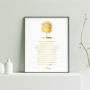 May include: A gold foil print of a poem about a tree, with the text "I think that I shall never see A poem lovely as a tree." The poem is by Joyce Kilmer.