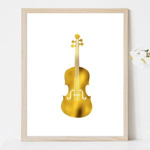 May include: A gold foil print of a violin on a white background. The print is framed in a light wood frame.