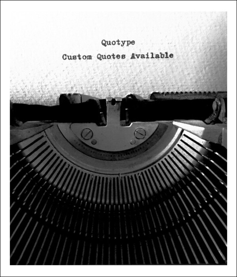 May include: A black and white image of a vintage typewriter with the text "Quotype Custom Quotes Available" typed on a sheet of paper.