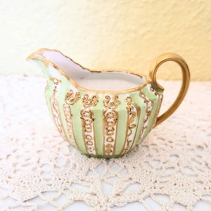 T V limoges hand painted creamer