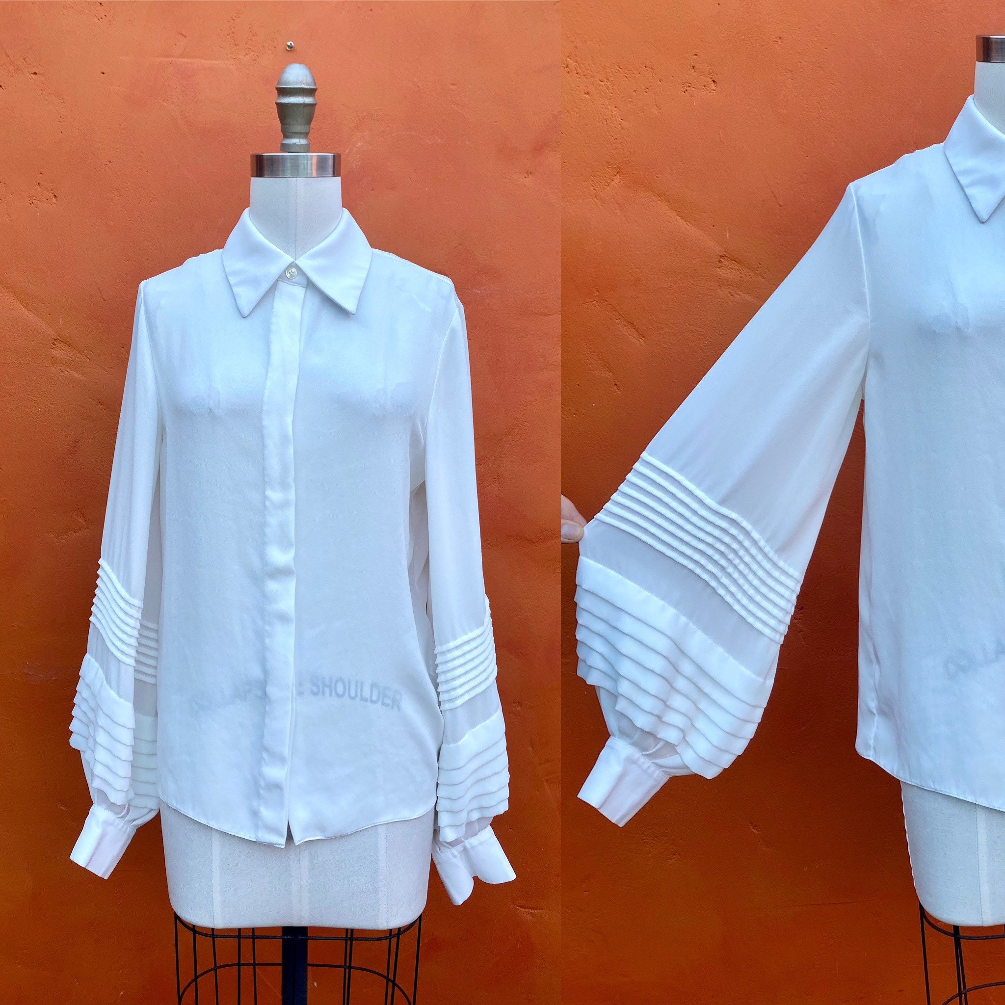 Louis Vuitton White Blouse with Black Trim Ruffled Collar — The Posh Pop-Up