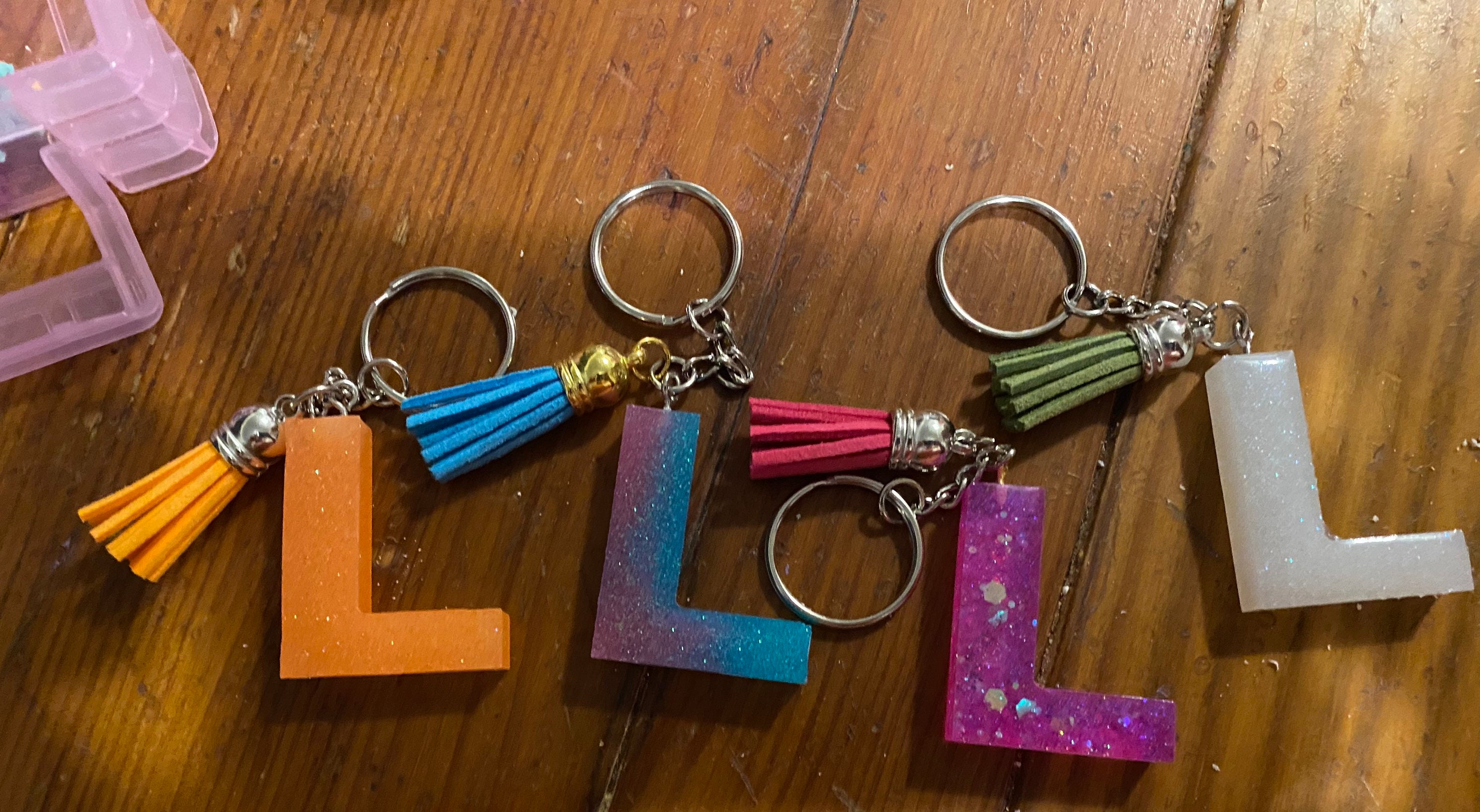 Epoxy letter keychains.Every letter available All proceeds go Etsy