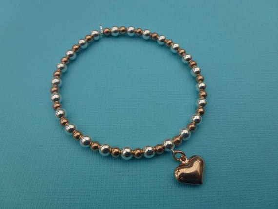 925 Sterling Silver Ball Bead Noodle Roodle Bracelet with Cancer Ribbon Charm 925 Sterling Silver Ball Bead Noodle Roodle Bracelet with Cancer Ribbon Charm