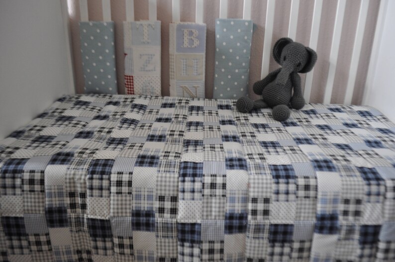 grey and blue cot bedding