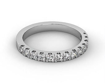 May include: A silver band with a row of small diamonds set in a channel setting.