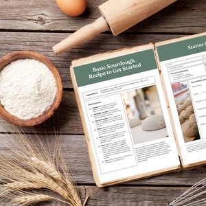 May include: A close-up of a recipe for basic sourdough bread. The recipe includes ingredients and instructions for making sourdough bread. The image also shows a wooden rolling pin and a bowl of flour.