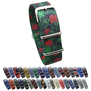 May include: A selection of colourful patterned watch straps with silver buckles. The straps are made of nylon and feature a range of designs, including floral, geometric and plaid.