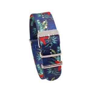 May include: A blue and red patterned watch strap with silver hardware and the text "HNS" on the buckle.