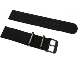 May include: Black nylon watch strap with a black metal buckle.