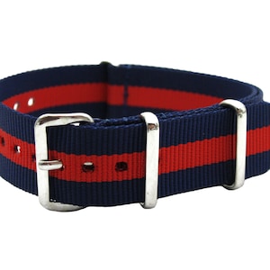 May include: A navy blue watch strap with two red stripes and silver buckle.